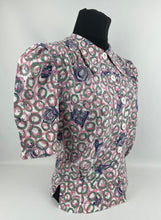 Load image into Gallery viewer, 1940's Reproduction Novelty Print Blouse with Clocks and Clock Hands with White Buttons Made From an Original 1940's Feed Sack - Bust 34"