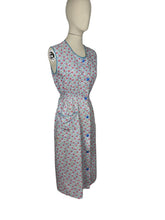 Load image into Gallery viewer, Original 1940's Floral Cotton Sleeveless Chore Dress in Blue, Red, Green and White - Bust 36 37 38