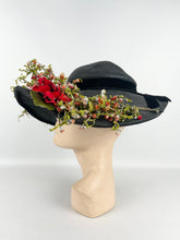 Load image into Gallery viewer, Absolutely Incredible Huge Black Straw Hat with Wonderful Flower Trim from the 1920's or 1930's *