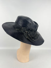 Load image into Gallery viewer, Original 1940's Dark Blue Lacquered Straw Hat with Net Covered Flower Trim by Peter Robinson *