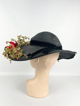 Load image into Gallery viewer, Absolutely Incredible Huge Black Straw Hat with Wonderful Flower Trim from the 1920's or 1930's *