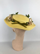 Load image into Gallery viewer, Original 1940s or 1950s Yellow Straw Hat with Wavy Brim and White and Green Floral Trim