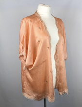 Load image into Gallery viewer, 1920s Apricot Coloured Pure Silk Bed Jacket with Floral Embroidery -  Bust 36" 38" 40"