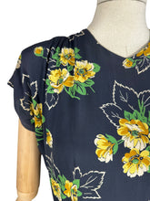 Load image into Gallery viewer, Original 1940's Navy Day Dress with Double Peplum and Floral Print in Green and Yellow - Bust 34 35
