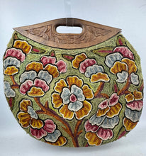 Load image into Gallery viewer, Original 1920’s Crewel Work Bag with Flowers in Green, Rust, Pink and Blue with Carved Wooden Handles
