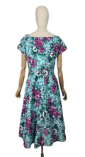 Load image into Gallery viewer, Original 1950's Marldena Model Blue Cotton Day Dress with Pink, Black, Teal and Black Floral Print and Hip Swag - Bust 35 *
