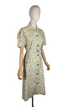 Load image into Gallery viewer, Original 1940's CC41 Floral Cotton House Dress in Green, Blue, Orange and Yellow - Bust 40”
