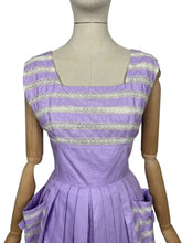 Load image into Gallery viewer, Original 1950&#39;s Carnegie Model Pale Lilac Cotton Day Dress with White Lace Detail and Bow Trimmed Pockets - Bust 38
