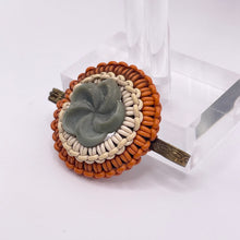 Load image into Gallery viewer, Original 1940&#39;s Orange and White Wartime Make Do and Mend Wire Brooch with Grey Button Middle
