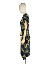 Load image into Gallery viewer, Original 1940's Navy Day Dress with Double Peplum and Floral Print in Green and Yellow - Bust 34 35
