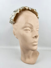 Load image into Gallery viewer, Original 1950&#39;s Ice Blue and Ivory Lacquered Raffia Half Hat with Petal Trim and Velvet Bow
