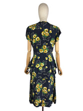 Load image into Gallery viewer, Original 1940's Navy Day Dress with Double Peplum and Floral Print in Green and Yellow - Bust 34 35

