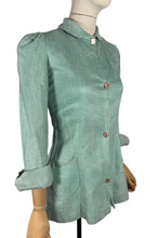 Load image into Gallery viewer, Original 1930's Wounded But Wearable Pale Green Bed Jacket with Pink Glass Buttons - Bust 32
