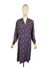 Load image into Gallery viewer, Original 1940's Navy Blue Crepe Long Sleeved Day Dress with Floral Print in Pink and Purple
