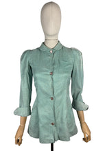 Load image into Gallery viewer, Original 1930's Wounded But Wearable Pale Green Bed Jacket with Pink Glass Buttons - Bust 32
