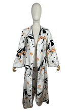 Load image into Gallery viewer, Original Vintage 1960&#39;s 1970&#39;s White, Black and Orange Robe with Novelty Umbrella Print - Bust 34 36
