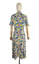 Load image into Gallery viewer, Original 1940's Bold Floral Crepe Day Dress in Pink, Green, Black and Yellow with Mother of Pearl Buttons - Bust 34
