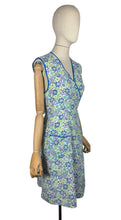 Load image into Gallery viewer, Original 1940's Floral Wraparound Apron in White, Purple, Blue and Green - Pretty Pinny - Bust 32 34 36

