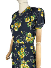 Load image into Gallery viewer, Original 1940's Navy Day Dress with Double Peplum and Floral Print in Green and Yellow - Bust 34 35
