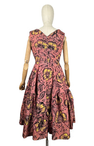 Original 1950's Salmon Pink Grosgrain Full Circle Day Dress with Bold Floral in Yellow, White and Black Flock - Bust 36