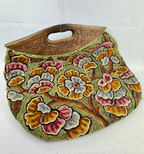 Load image into Gallery viewer, Original 1920’s Crewel Work Bag with Flowers in Green, Rust, Pink and Blue with Carved Wooden Handles
