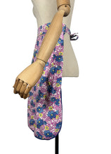 Load image into Gallery viewer, Original 1940's Feed Sack Apron - White Ground with Pink Leaves and Flowers in Blue and Yellow
