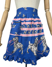 Load image into Gallery viewer, Original 1950&#39;s Bright Cotton Novelty Print Frilly Pinny with Spaniel Dogs on Blue - Waist 30
