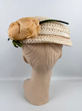 Load image into Gallery viewer, Original 1950&#39;s Cream Lacquered Raffia Hat with Pretty Apricot Rose Trim
