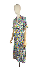 Load image into Gallery viewer, Original 1940's Bold Floral Crepe Day Dress in Pink, Green, Black and Yellow with Mother of Pearl Buttons - Bust 34
