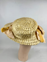 Load image into Gallery viewer, Original Late 1940's or Early 1950's Walter Florell Raffia Hat in Yellow with Velvet Ribbon Trim *
