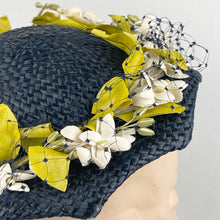 Load image into Gallery viewer, Original 1950’s Lacquered Raffia Hat with Flower Trim and Net in Navy, White and Yellow
