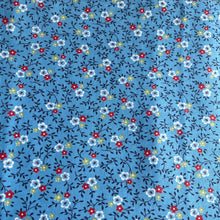 Load image into Gallery viewer, Vintage Cotton Dressmaking Fabric - Blue Base with Ditsy Floral Print in Red, White and Green - 35&quot; x 88&quot;
