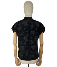 Load image into Gallery viewer, Original 1950’s Black Artificial Silk Blouse with Silver and Gold Glitter Floral Print and Glass Buttons - Bust 36 *
