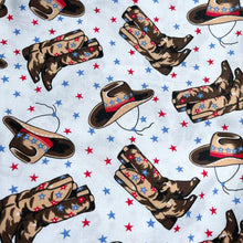 Load image into Gallery viewer, 100% Cotton Dressmaking Fabric - White with Cowboy Print in Brown, Red and Blue with Stars - 58&quot; x 38&quot;
