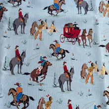 Load image into Gallery viewer, Cowboy Country by Riley Blake - Cowboy Themed Print with Horses and Wagons on Cream - 100% Cotton Dressmaking Fabric - 42&quot; x 70&quot;
