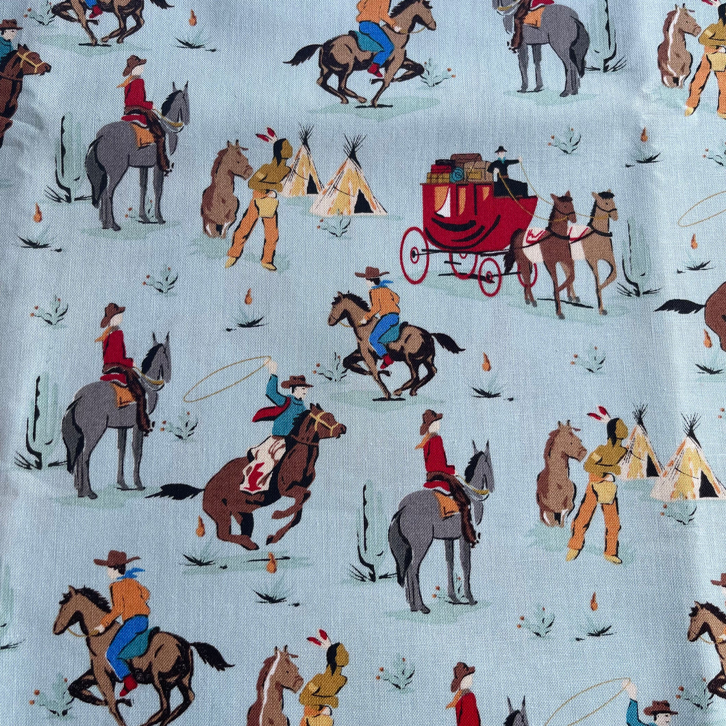 Cowboy Country by Riley Blake - Cowboy Themed Print with Horses and Wagons on Cream - 100% Cotton Dressmaking Fabric - 42