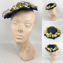 Load image into Gallery viewer, Original 1950’s Lacquered Raffia Hat with Flower Trim and Net in Navy, White and Yellow
