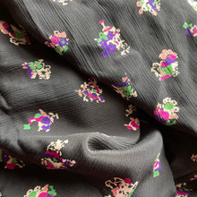Load image into Gallery viewer, Original 1940&#39;s Black Pure Silk Novelty Print Dressmaking Fabric with Flowers and Houses in Pink, Green and Purple - 35&quot; x 140&quot;
