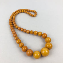 Load image into Gallery viewer, 1940s Egg Yolk Yellow Bakelite Necklace
