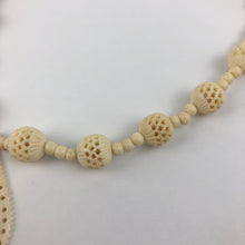 Load image into Gallery viewer, 1930s or 1940s Carved Bone Elephant Necklace

