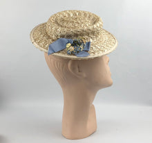 Load image into Gallery viewer, 1940&#39;s Cream Lacquered Frances Adams Raffia Hat with Pale Blue Floral Trim *
