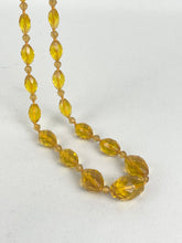 Load image into Gallery viewer, Original 1940s 1950s Amber Coloured Faceted Glass Graduated Bead Necklace

