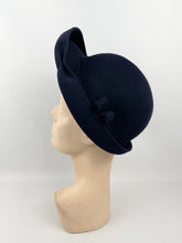 Load image into Gallery viewer, Original Late 1930s or Early 1940s Close Fitting Dark Blue Felt Hat with Neat Trim and Upturned Brim
