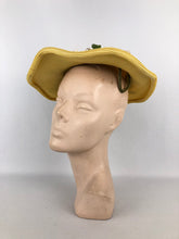 Load image into Gallery viewer, Original 1940s or 1950s Yellow Straw Hat with Wavy Brim and White and Green Floral Trim
