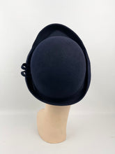 Load image into Gallery viewer, Original Late 1930s or Early 1940s Close Fitting Dark Blue Felt Hat with Neat Trim and Upturned Brim
