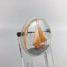 Load image into Gallery viewer, Original 1940s 1950s Circular Reverse Carved Lucite Brooch with Sailing Ship on the Sea
