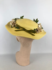 Original 1940s or 1950s Yellow Straw Hat with Wavy Brim and White and Green Floral Trim